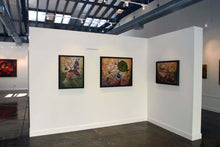 Load image into Gallery viewer, Victor Huerta Batista Alicia en el País de las Maravillas paintings displayed in an art gallery.