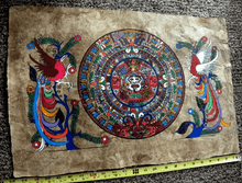 Load image into Gallery viewer, original amate paper artwork featuring T. Ramirez Aztec calendar with vibrant colors and intricate designs.